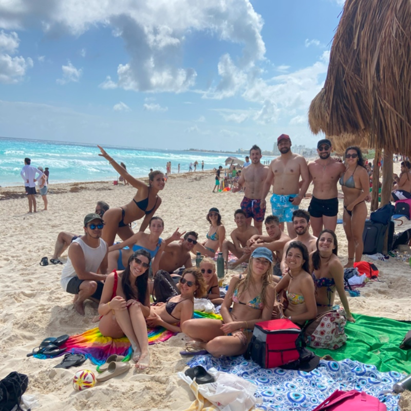 Mayan Monkey group photo on the beach in Cancun