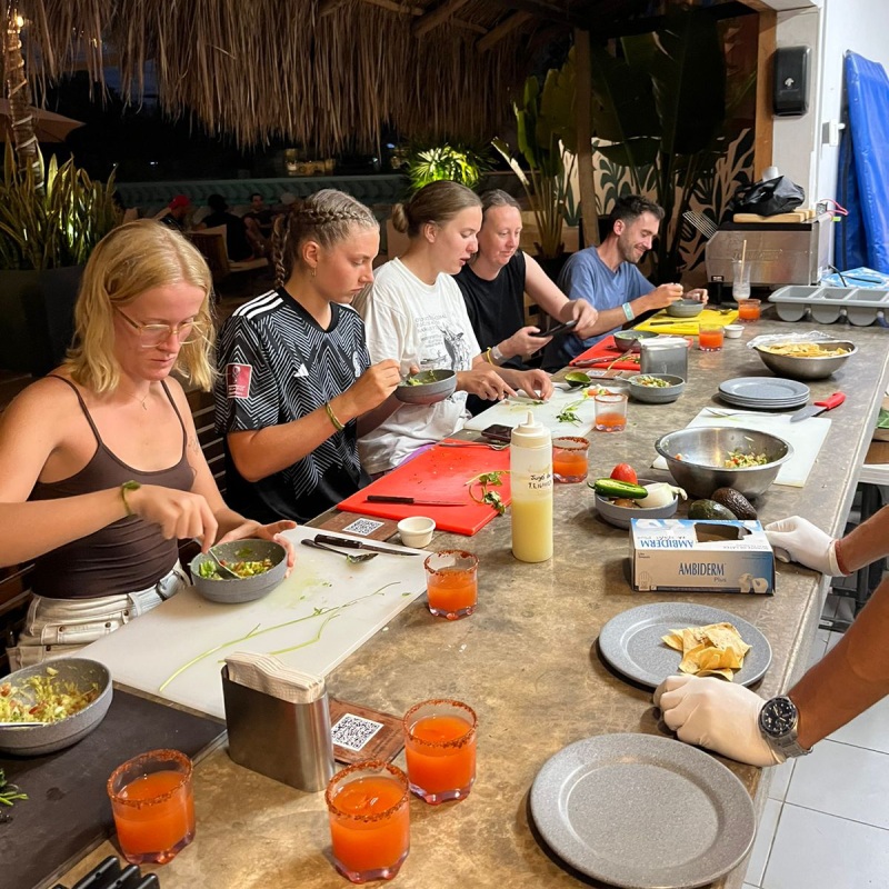 Guests preparing ceviche at a Mayan Monkey cooking class