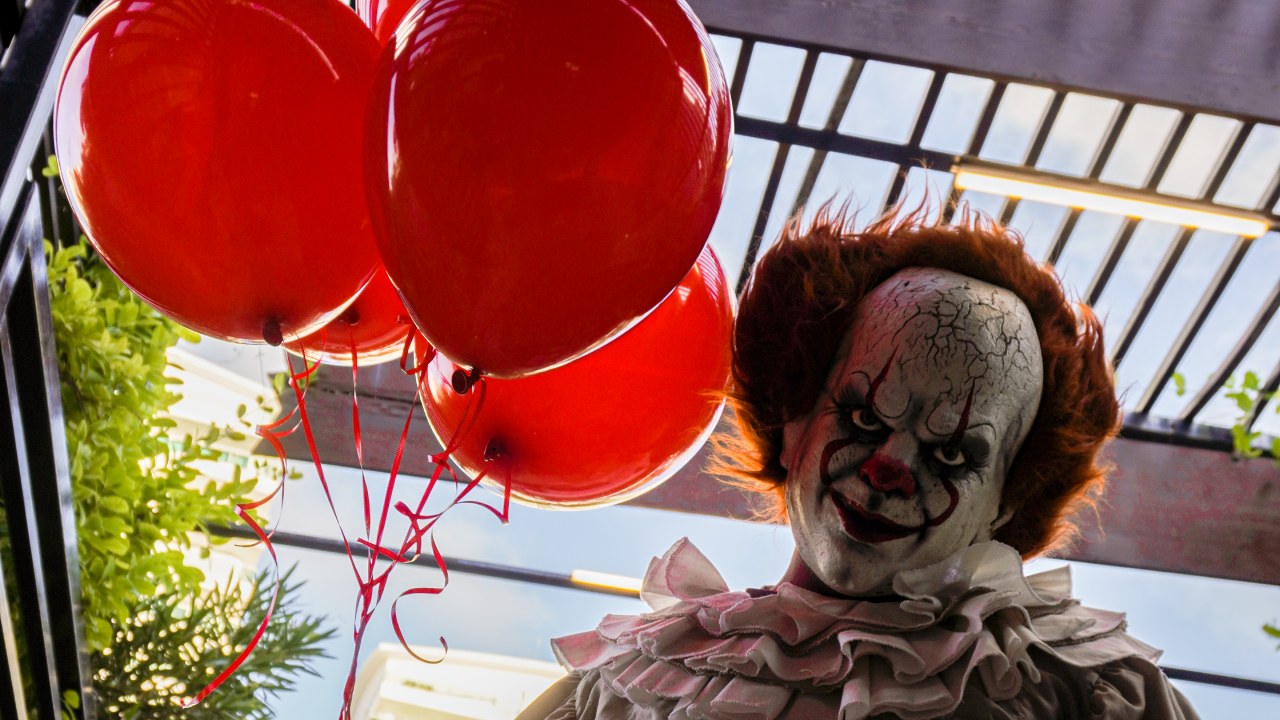 Mysterious creepy Halloween clown